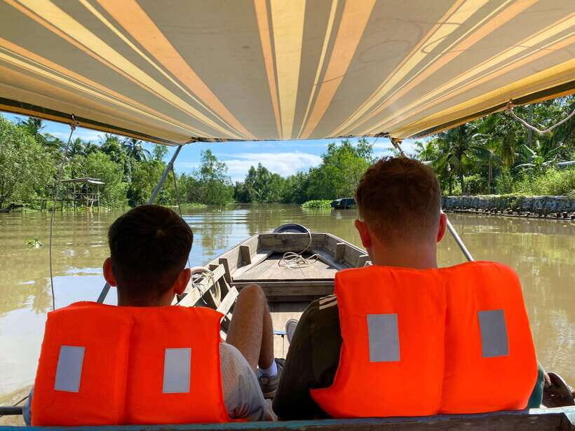 Can Tho: Explore Mekong, Floating Market, Cacao & Local Life - Pineapple, fish stalls, and boat-to-boat daily life