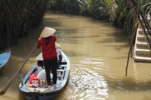 Cu Chi Tunnels and Mekong Delta 1 Day From Ho Chi Minh City - My Tho on the Mekong: motorboat, rowboat, fruit tasting, and village rides