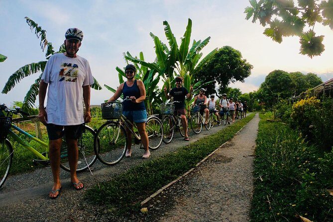 Full-Day Mekong Delta Tour - Sliding into smaller canals by rowing boat
