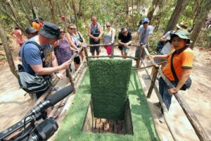 HCM: Cu Chi Tunnels-Tapioca Small Group Tour Morning or Afternoon - First stop at Cu Chi: films, exhibits, and the logic of the tunnels