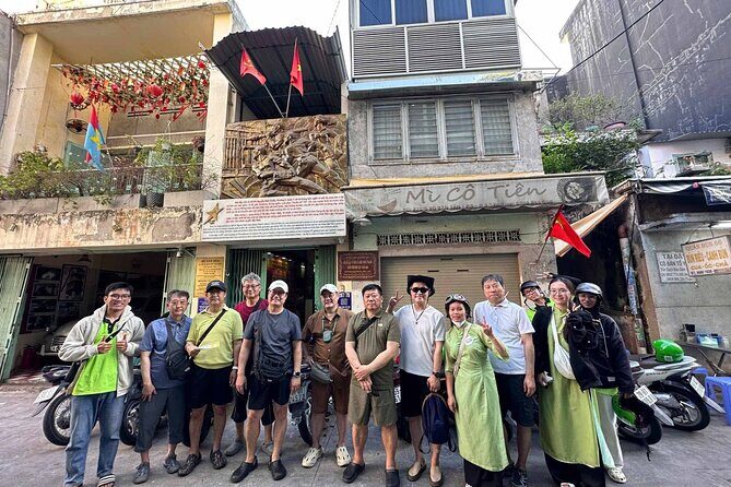 Ho Chi Minh City: Motorbike Street Food Tour with 12 Tastings - Your ride setup: helmet, rain poncho, and private-group comfort