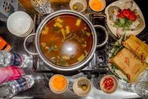 Phu Quoc Street Food Tour - Eat with Locals, Drink with Locals - First stop: Duong Dong Town street seats and starter-level BBQ