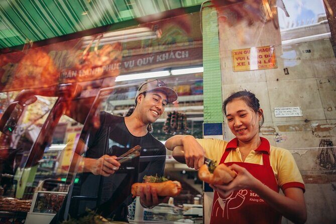 Saigon Night Bites on Foot: Local Vendors, Stories & Sweet Finish - A quick temple pass (Chùa Bà Thiên Hậu) that explains more than it looks