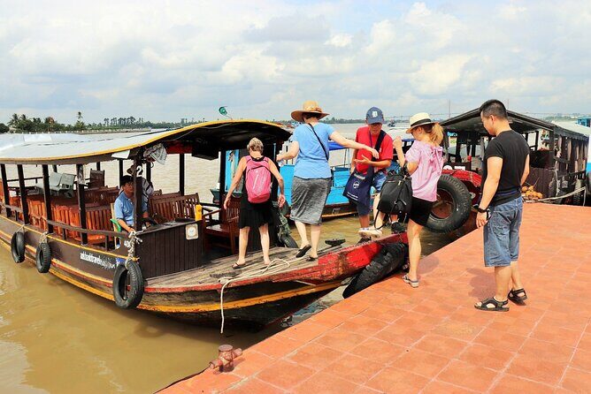Standard 1 Day Cu Chi Tunnels & Mekong Delta - The Village Visit: Fruit, Honey Tea, Folk Music, and Candy Making